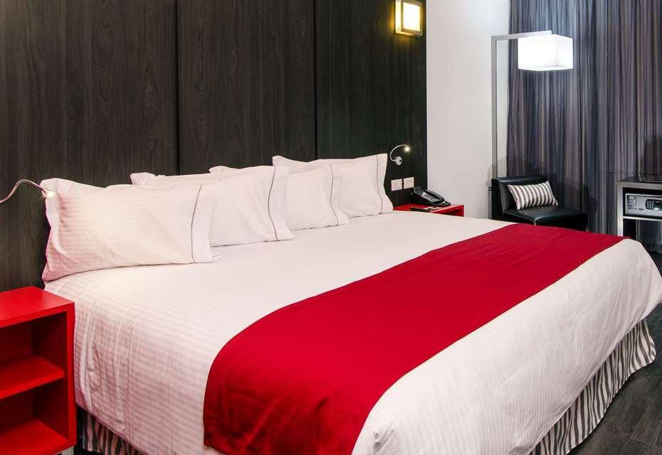 Ramada Encore By Wyndham Puebla Rom bilde