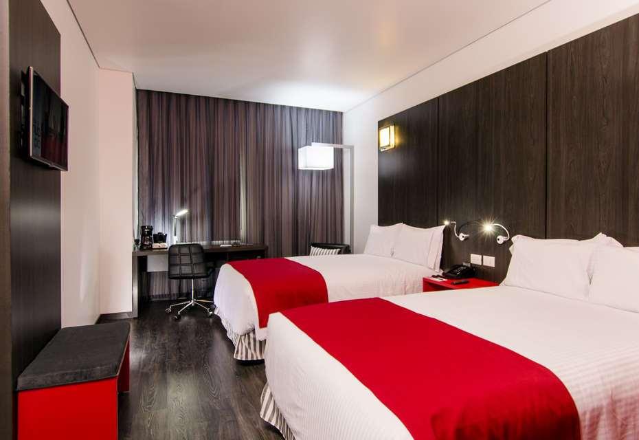 Ramada Encore By Wyndham Puebla Rom bilde